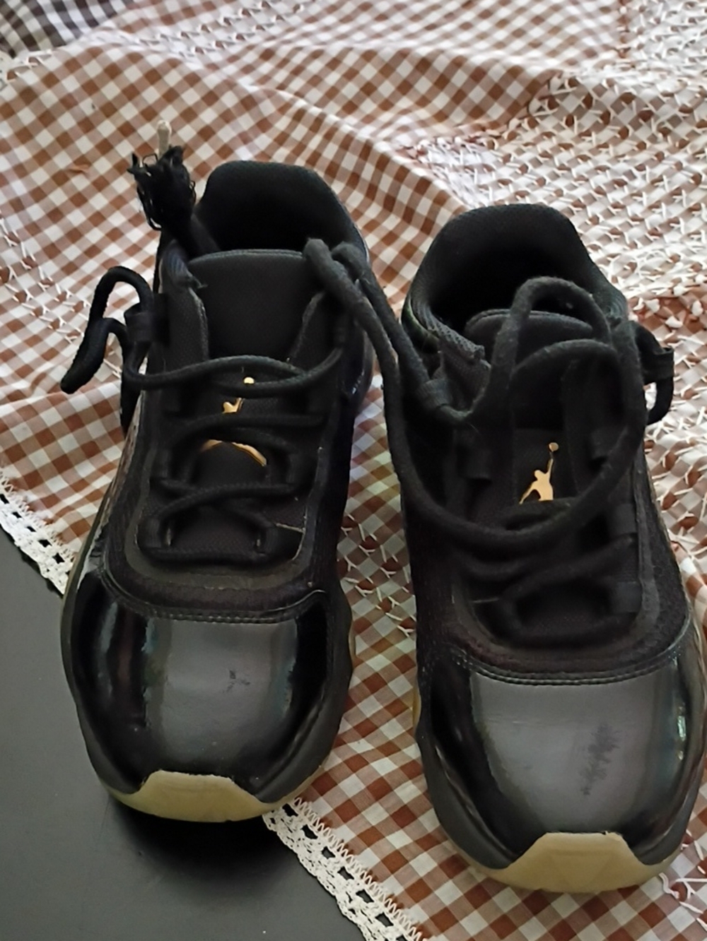5Y Nike Air Jordan 11 Kids Black Athletic Sneakers with Gold Detail